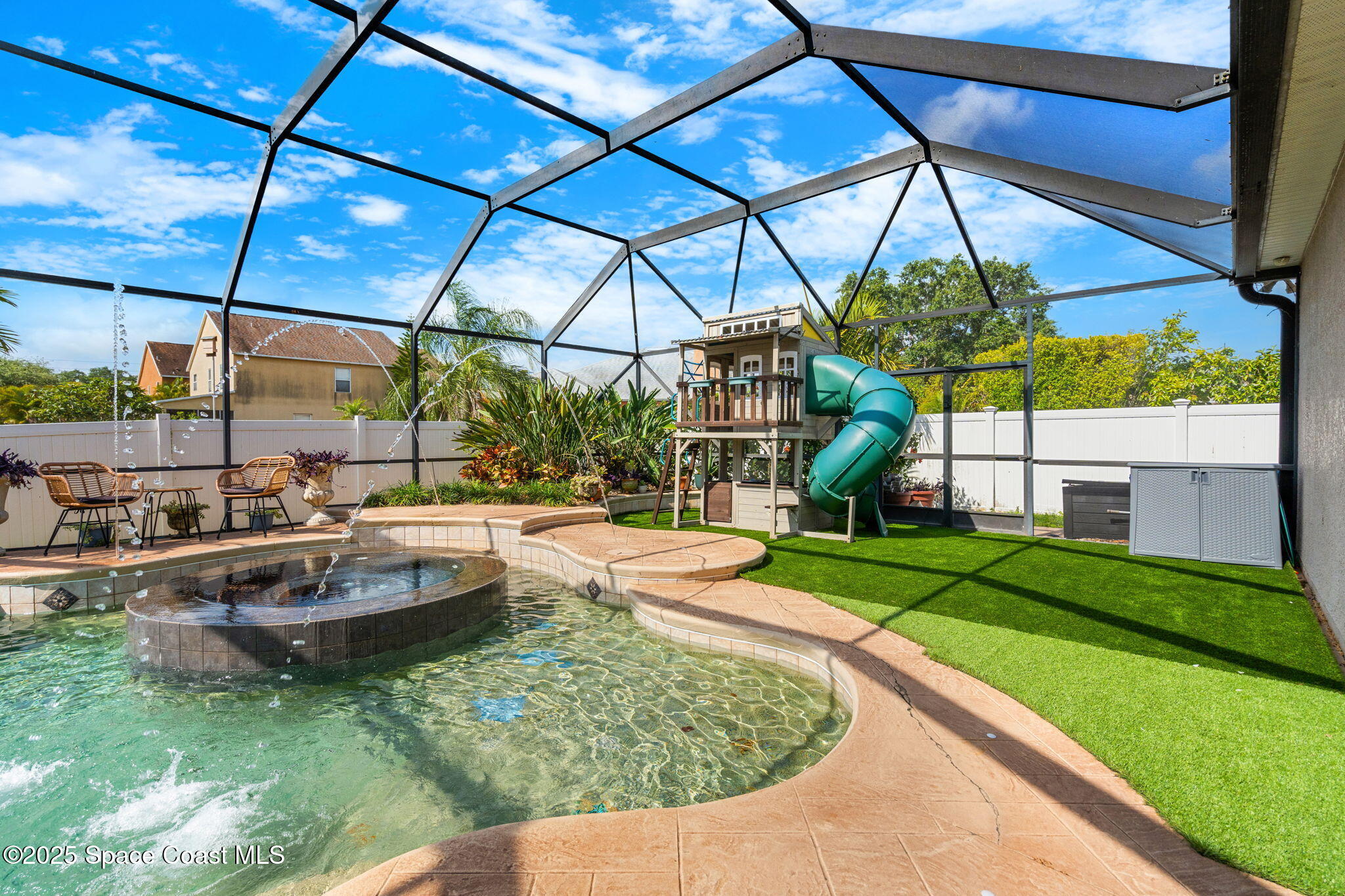 1331 Enclave Drive Rockledge, FL 32955 - Photo 29 of 43 a view of a swimming pool with a patio