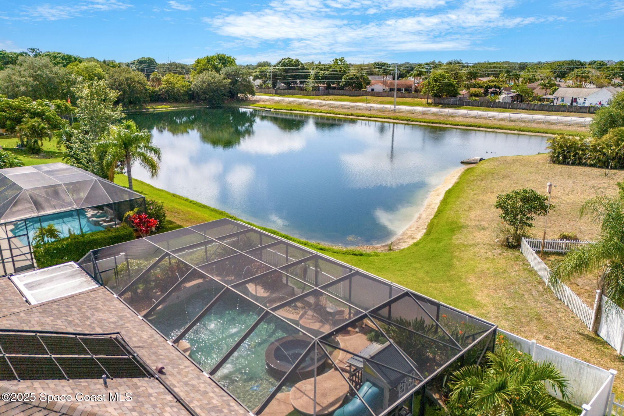 1331 Enclave Drive Rockledge, FL 32955 - Photo 36 of 43 an aerial view of a house with a lake view