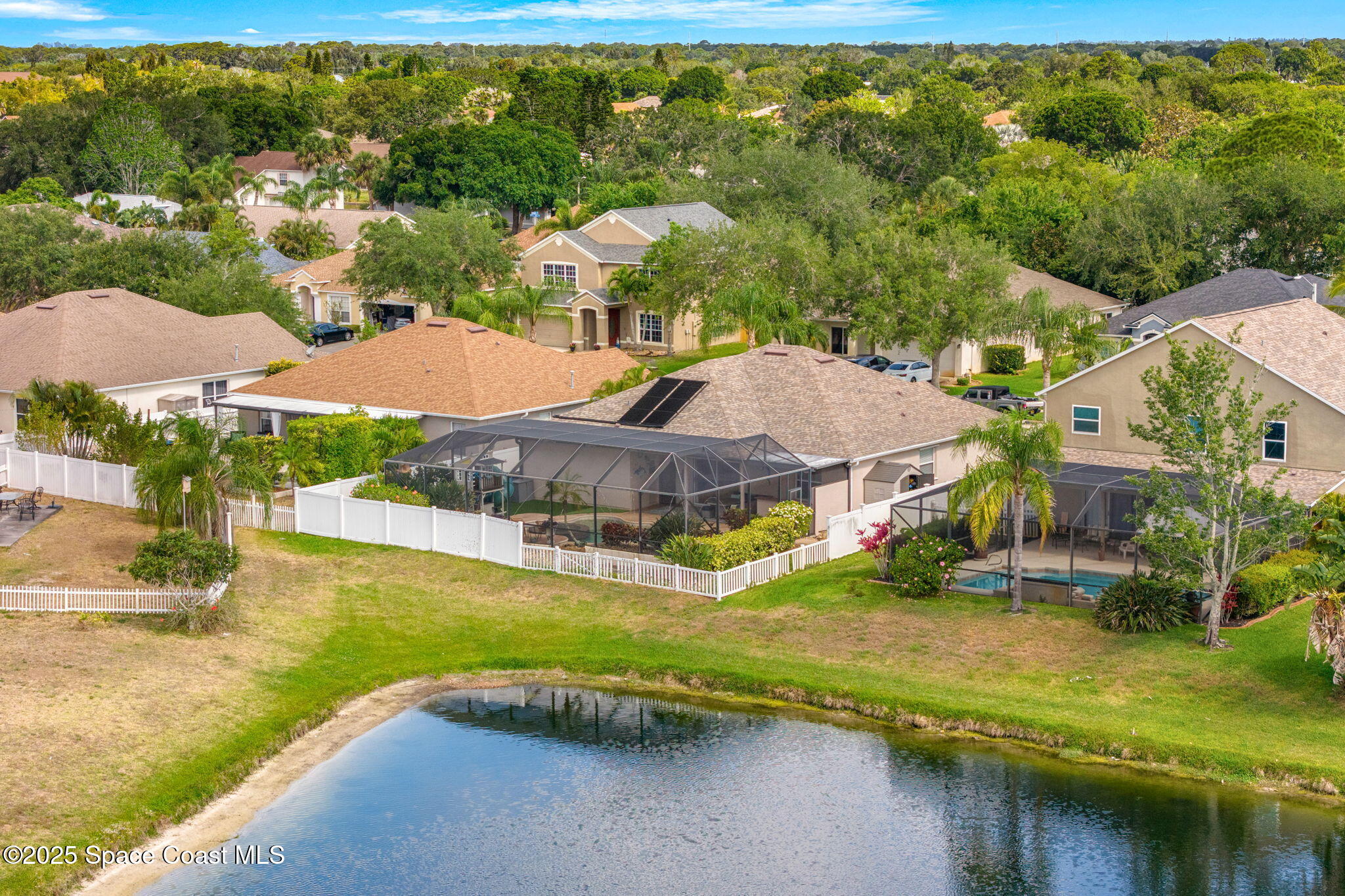 1331 Enclave Drive Rockledge, FL 32955 - Photo 40 of 43 an aerial view of residential houses with outdoor space and swimming pool