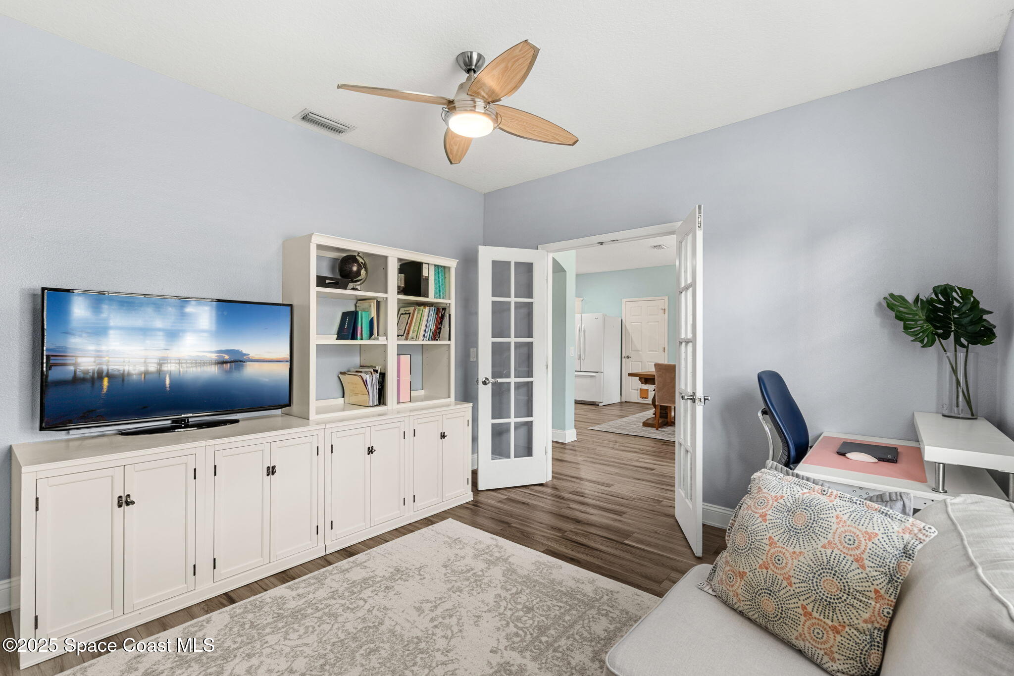1331 Enclave Drive Rockledge, FL 32955 - Photo 5 of 43 a living room with furniture and chandelier