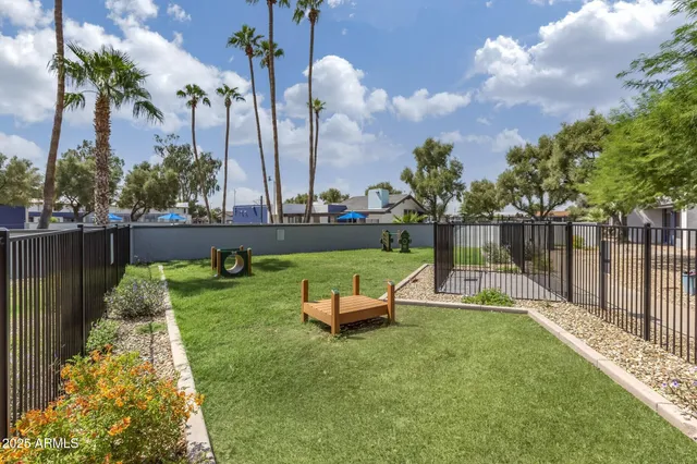 a garden view with a sitting space