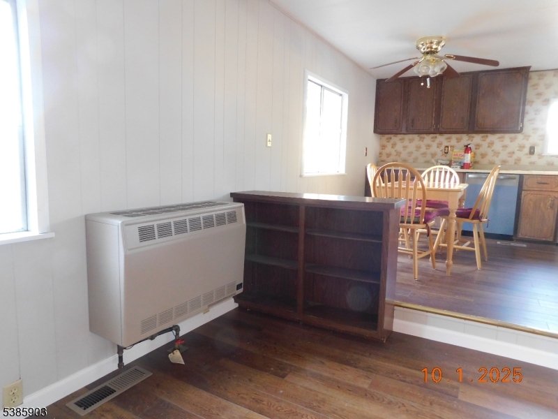 59 Back Street Oxford, NJ 07863 - Photo 13 of 25 a view of a kitchen with wooden floor and a window