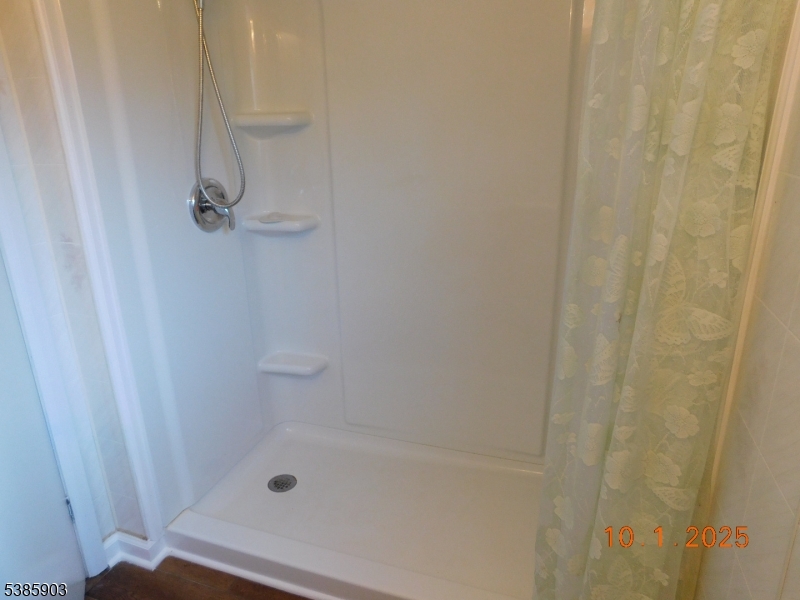59 Back Street Oxford, NJ 07863 - Photo 25 of 25 a bathroom with a shower