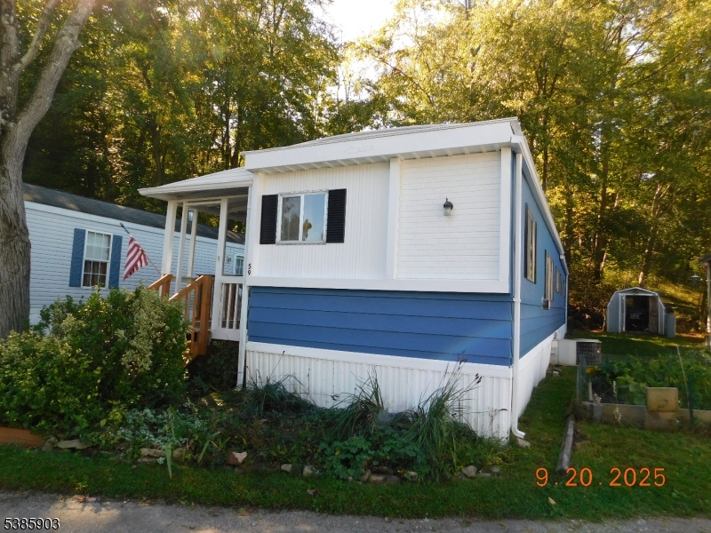 59 Back Street Oxford, NJ 07863 - Photo 5 of 25 a house with trees in the background