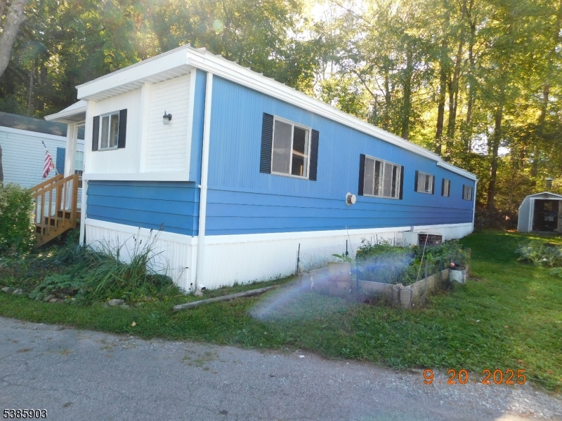 59 Back Street Oxford, NJ 07863 - Photo 6 of 25 a view of a house with a yard