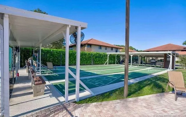 a view of swimming pool with a yard