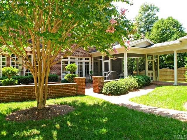 2305 Anderson Drive Raleigh, NC 27609 - Photo 11 of 12 Enjoy outdoor entertaining on this magnificent brick patio which adjoins the screened porch. A breezeway connects to the 2 car garage.