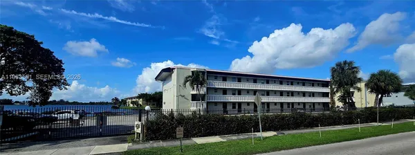 a view of building with yard