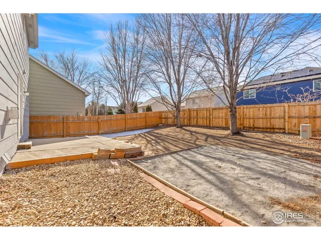 a view of a backyard of snow