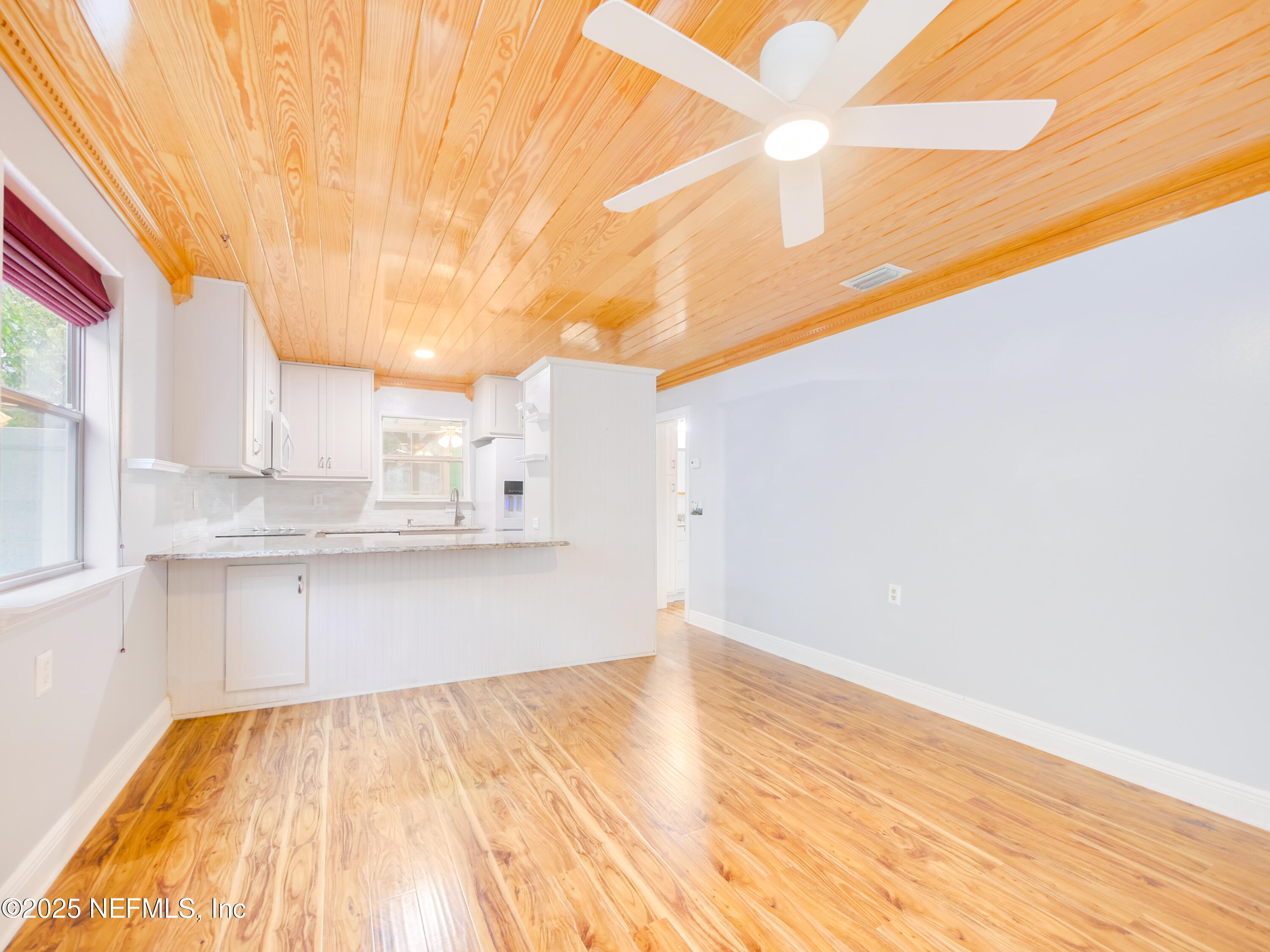 6472 Putnam Street St. Augustine, FL 32080 - Photo 21 of 26 a view of kitchen with granite countertop cabinets and sink