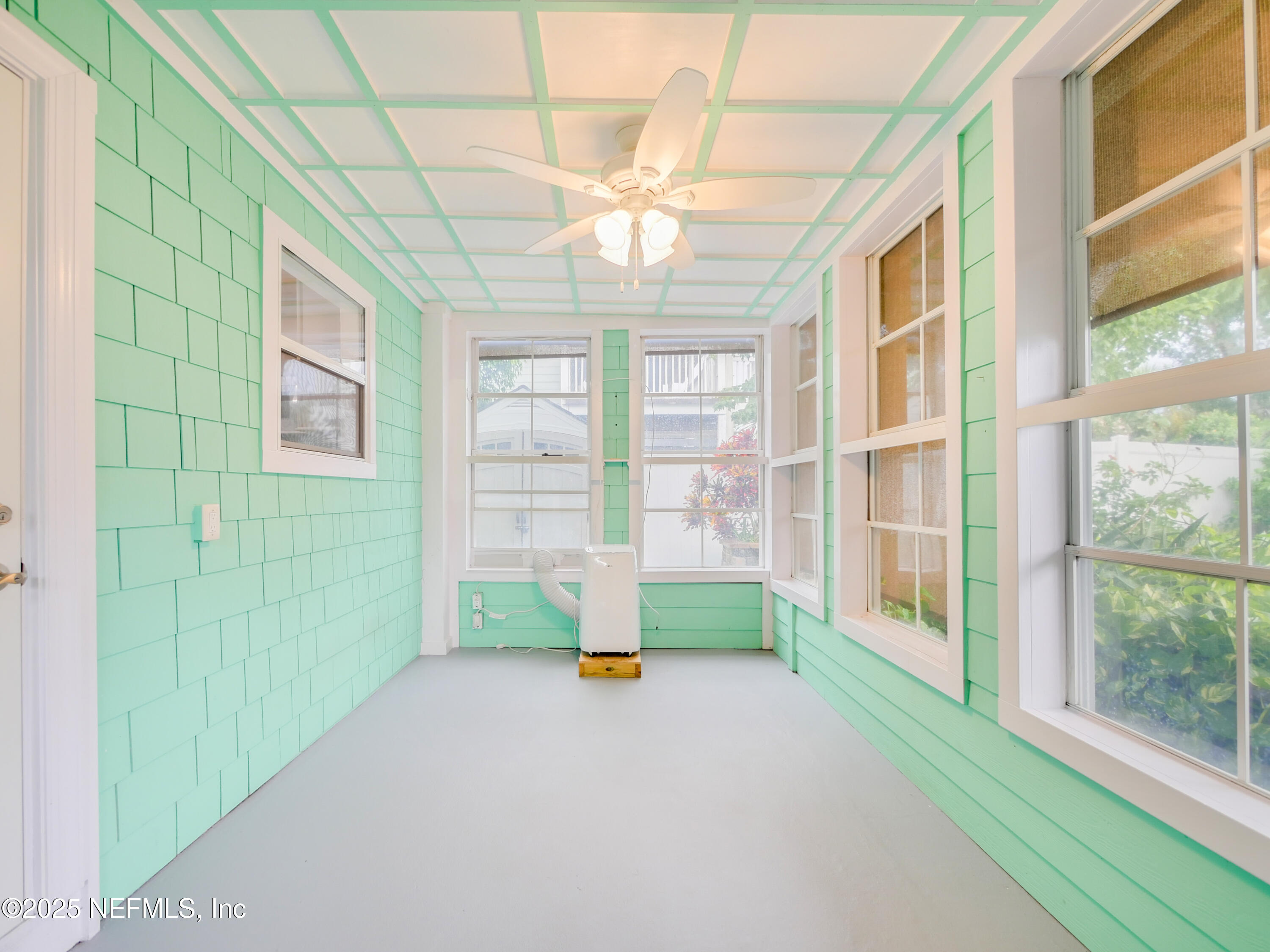 6472 Putnam Street St. Augustine, FL 32080 - Photo 22 of 26 a view of an empty room with a window