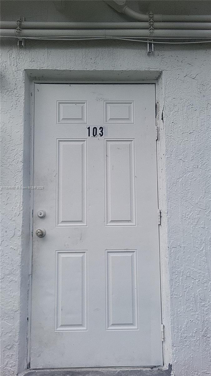 848 Southwest 5th Street, Unit 103 Homestead, FL 33030 - Photo 9 of 10 a view of a closet