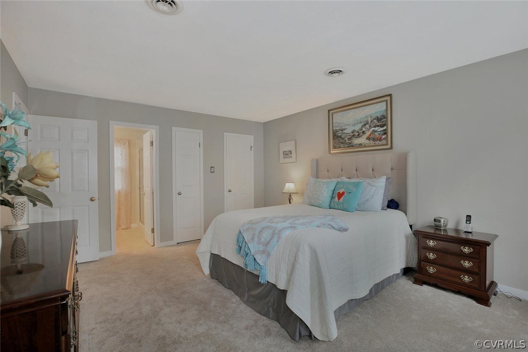 5717 Laurel Trail Road Midlothian, VA 23112 - Photo 19 of 28 a bedroom with a bed and a tv