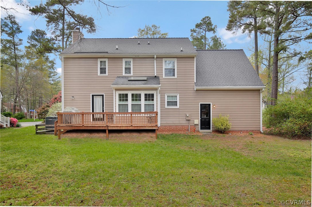 5717 Laurel Trail Road Midlothian, VA 23112 - Photo 27 of 28 a front view of a house with a garden