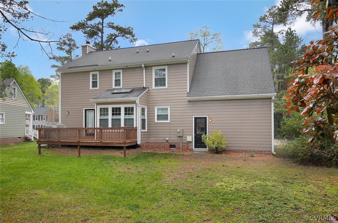 5717 Laurel Trail Road Midlothian, VA 23112 - Photo 28 of 28 a view of a house with a backyard and a patio
