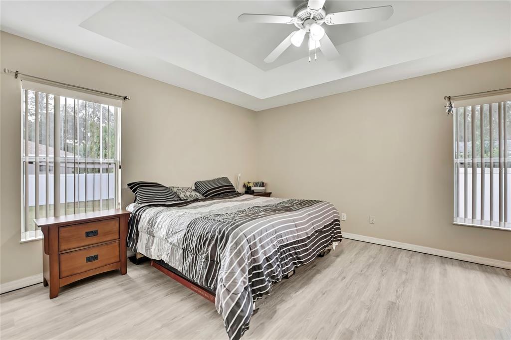 103 Daisy Lane Inverness, FL 34452 - Photo 15 of 40 a bedroom with a bed and a window