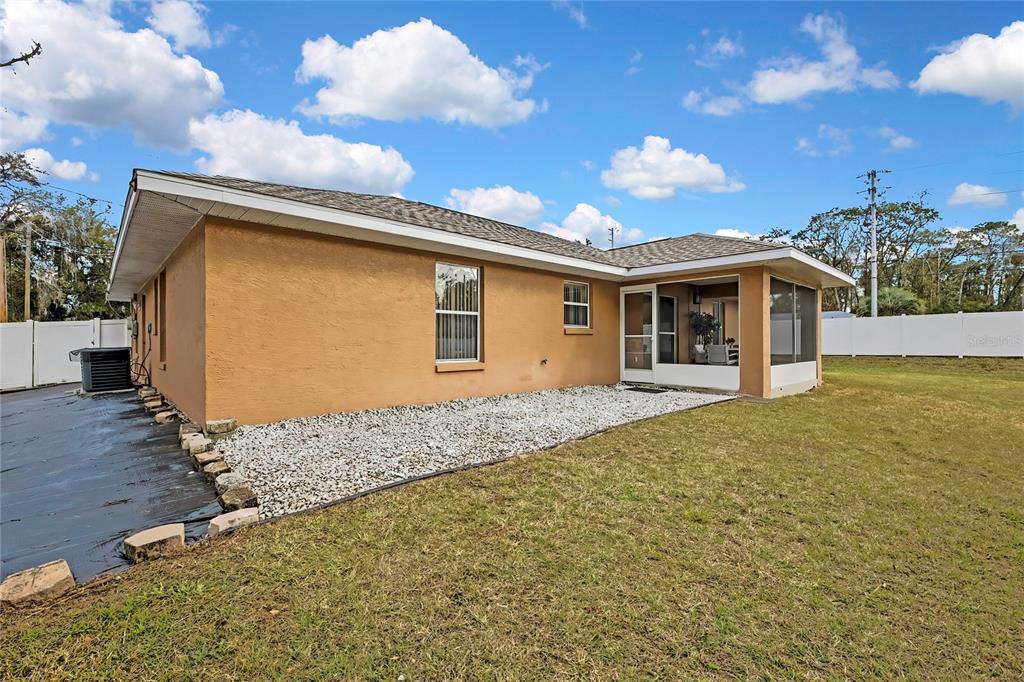 103 Daisy Lane Inverness, FL 34452 - Photo 27 of 40 a view of a house with a patio