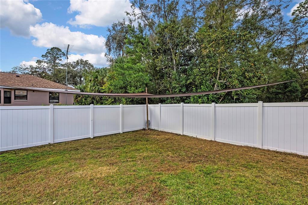 103 Daisy Lane Inverness, FL 34452 - Photo 29 of 40 a view of a backyard