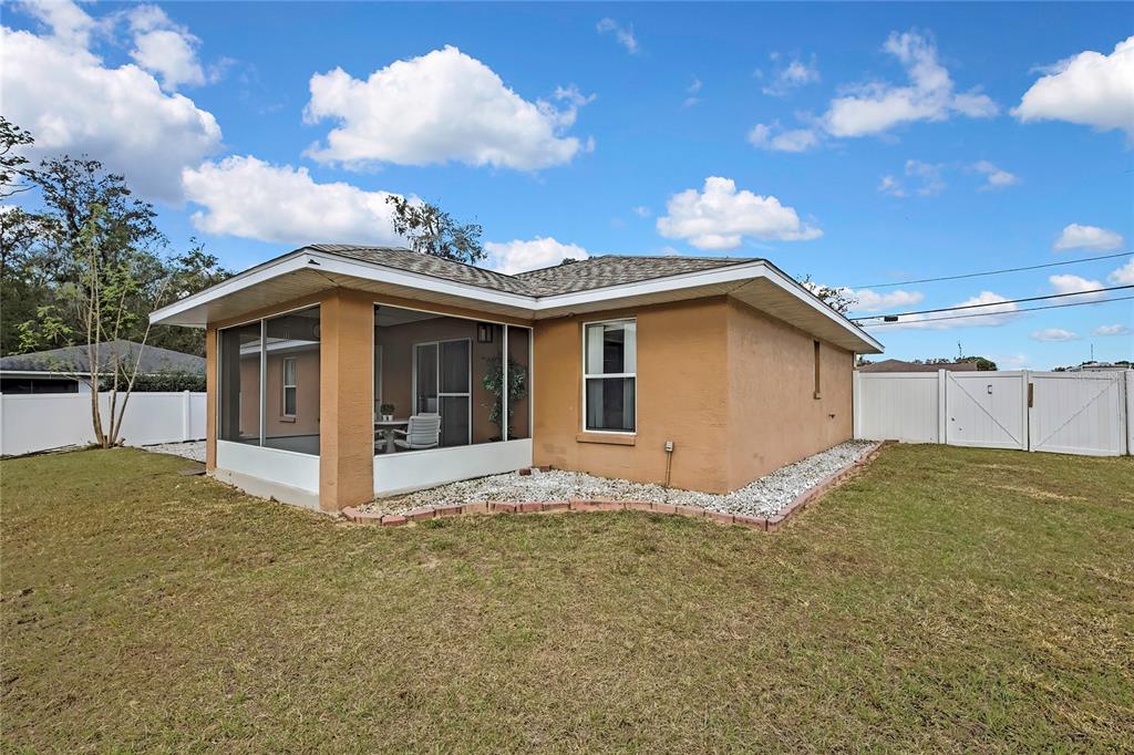 103 Daisy Lane Inverness, FL 34452 - Photo 31 of 40 a view of a house with a yard
