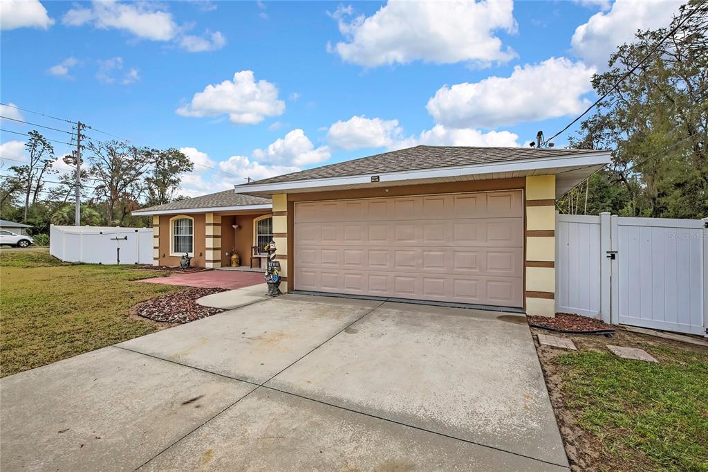 103 Daisy Lane Inverness, FL 34452 - Photo 34 of 40 a front view of house with yard