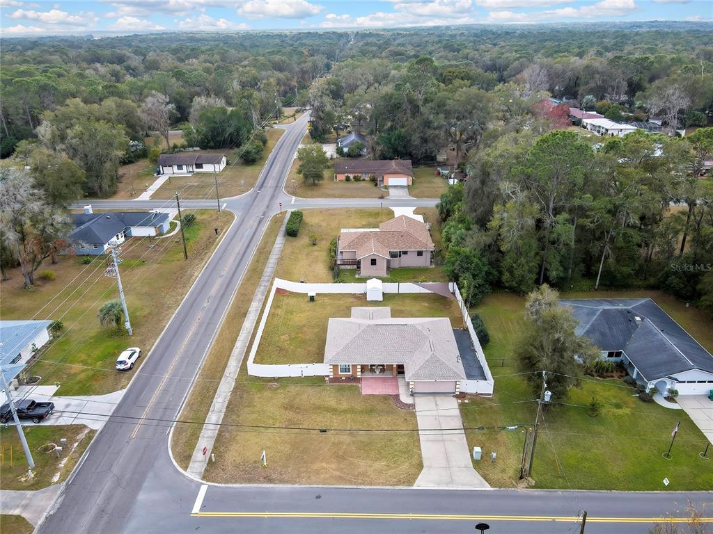 103 Daisy Lane Inverness, FL 34452 - Photo 39 of 40 swimming pool view with sitting space