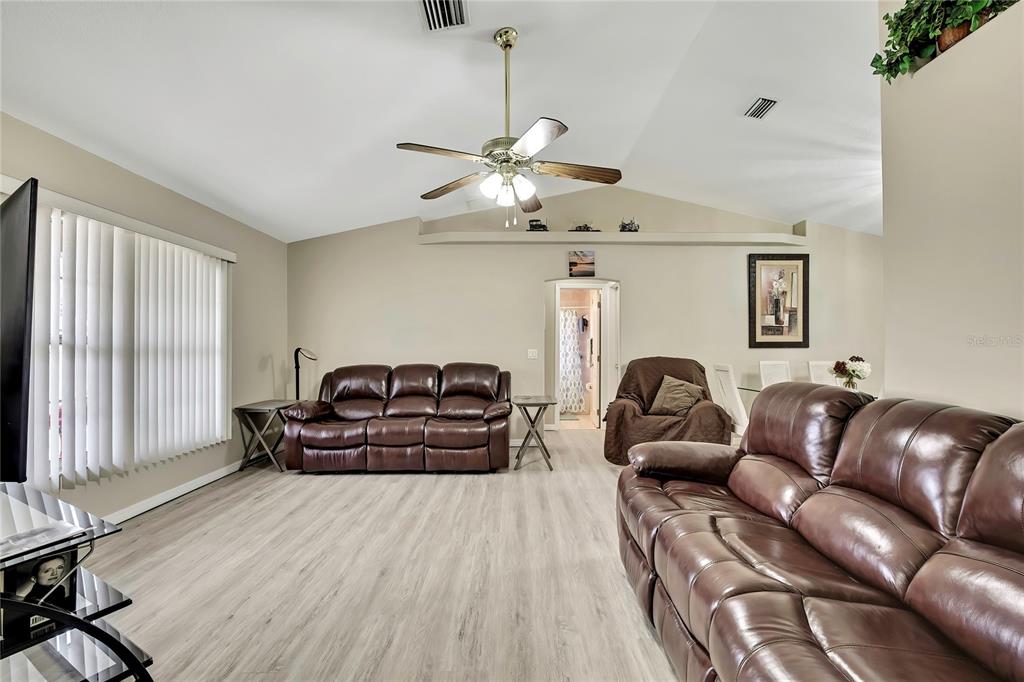 103 Daisy Lane Inverness, FL 34452 - Photo 6 of 40 a living room with furniture