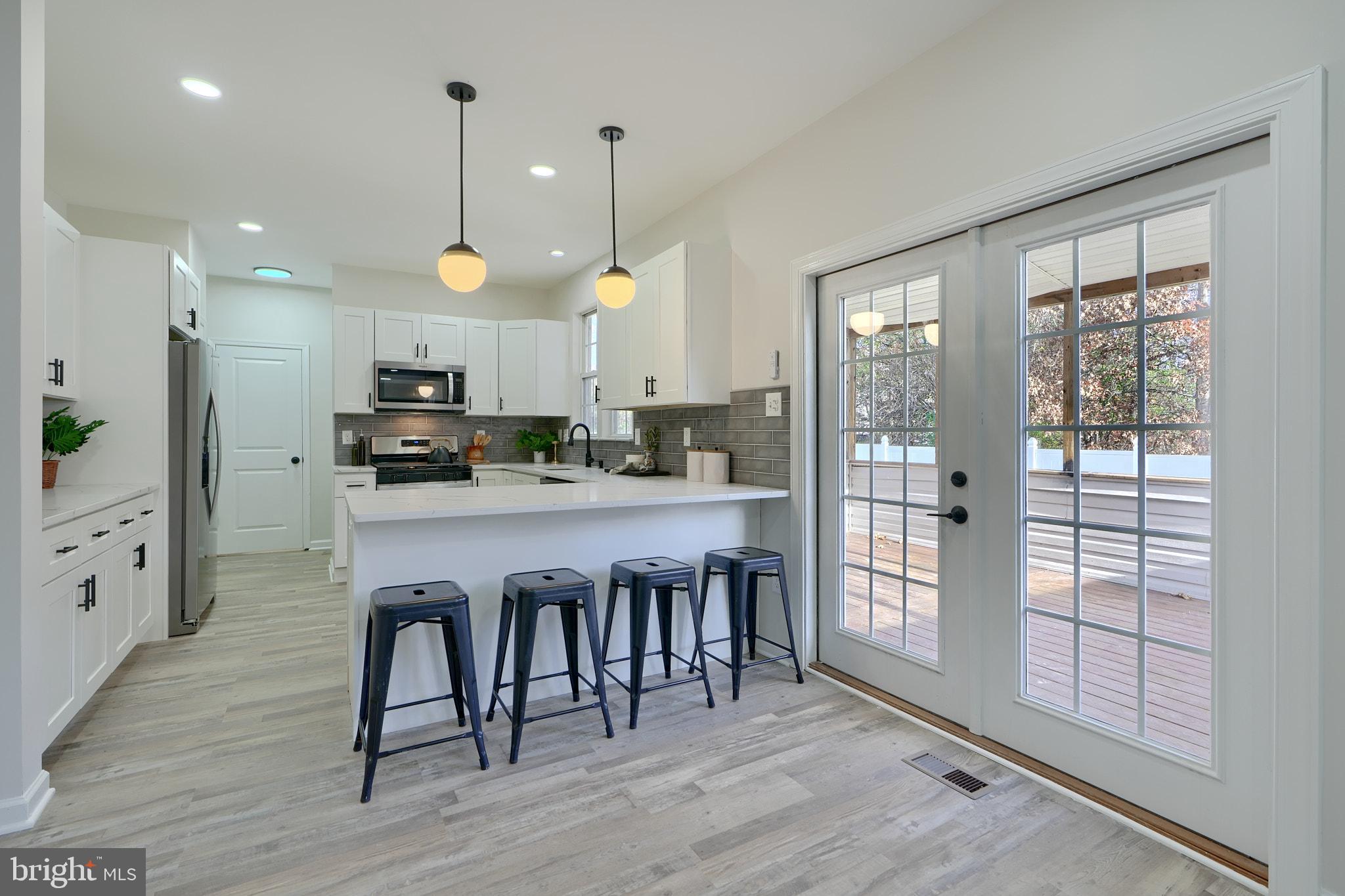 2801 Claybrooke Drive Windsor Mill, MD 21244 - Photo 20 of 63 Convenient access to covered rear porch