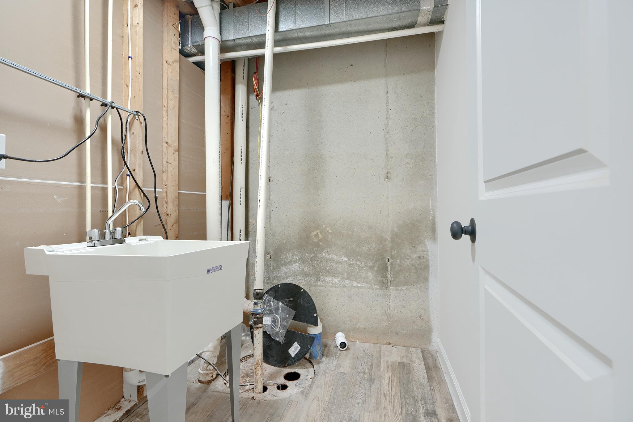 2801 Claybrooke Drive Windsor Mill, MD 21244 - Photo 44 of 63 Sump pump and utility sink