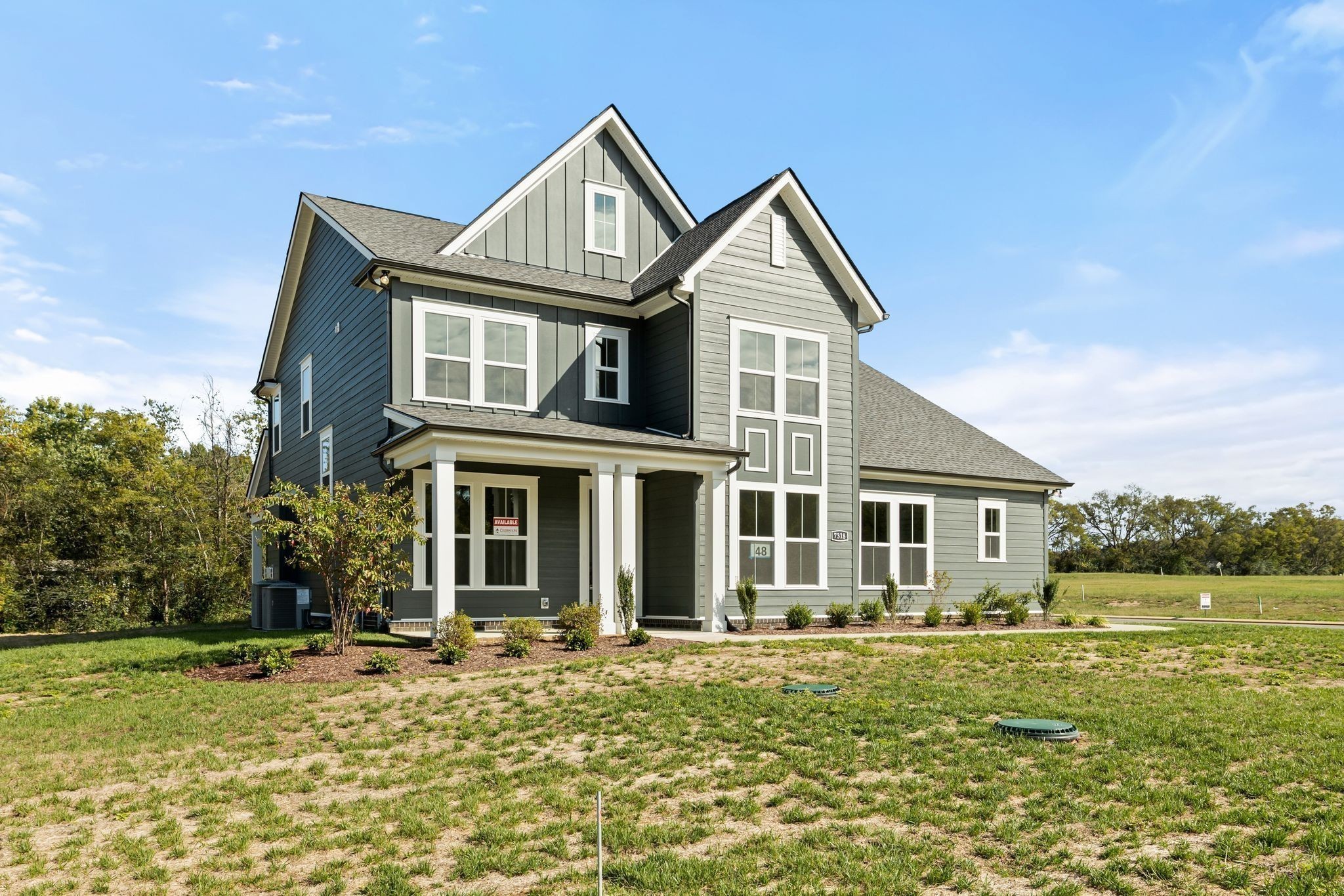 7318 Winners Road Murfreesboro, TN 37129 - Photo 1 of 44 a front view of a house with garden