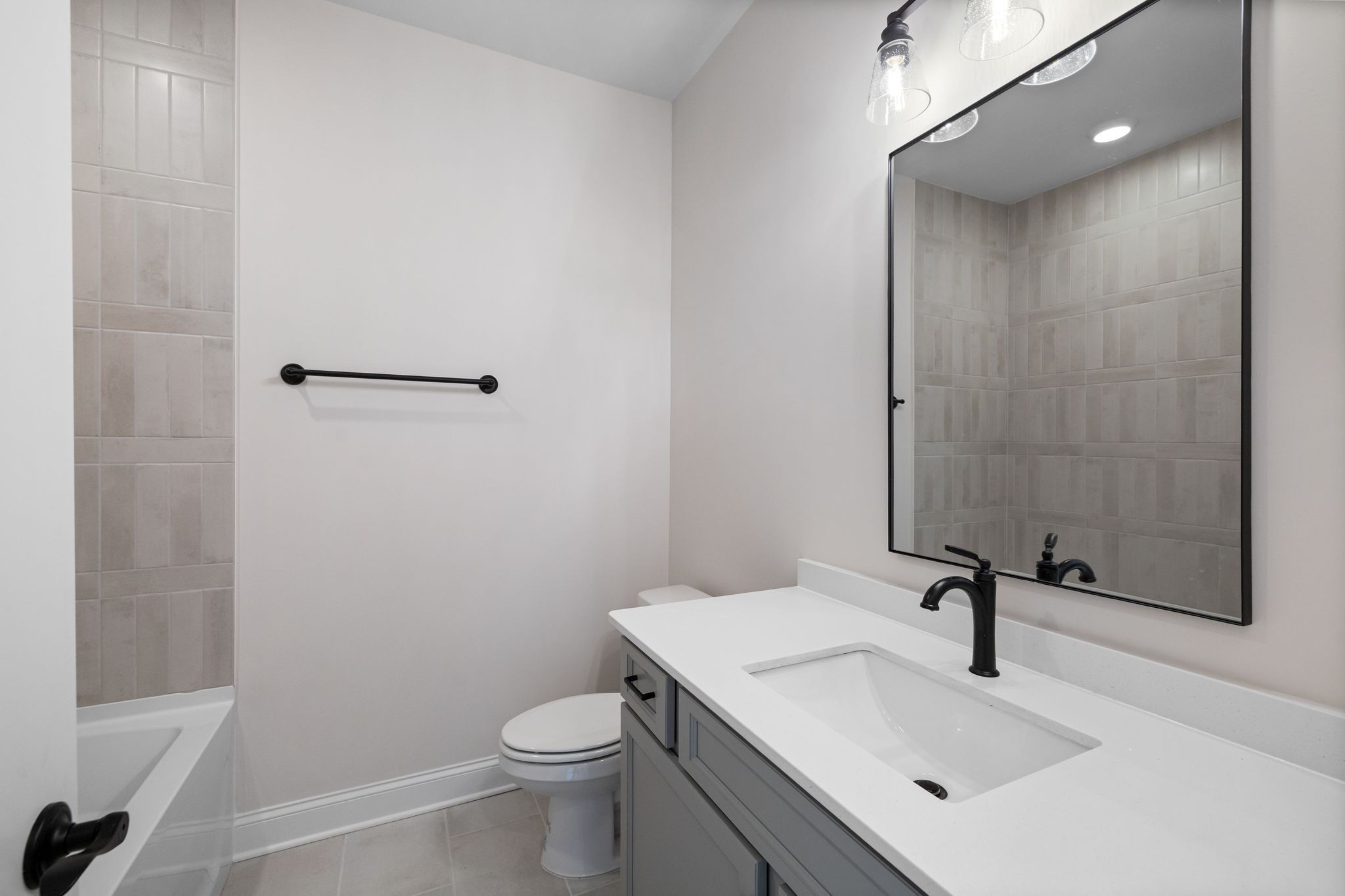 7318 Winners Road Murfreesboro, TN 37129 - Photo 12 of 44 a bathroom with a sink a toilet and shower