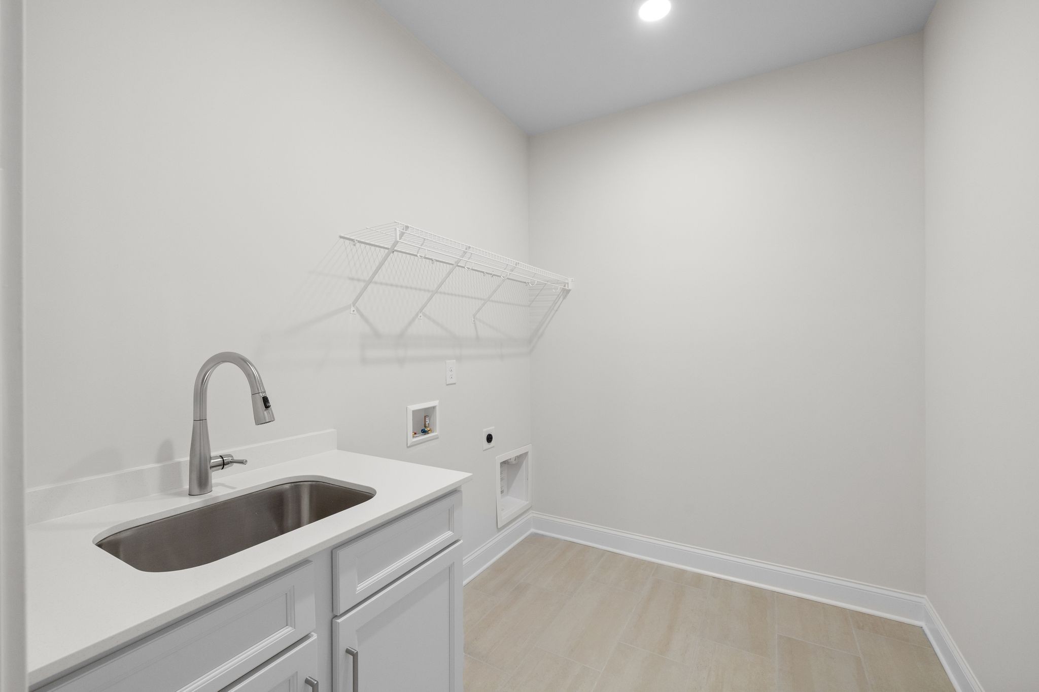 7318 Winners Road Murfreesboro, TN 37129 - Photo 20 of 44 a close view of a sink a faucet and appliance in the kitchen