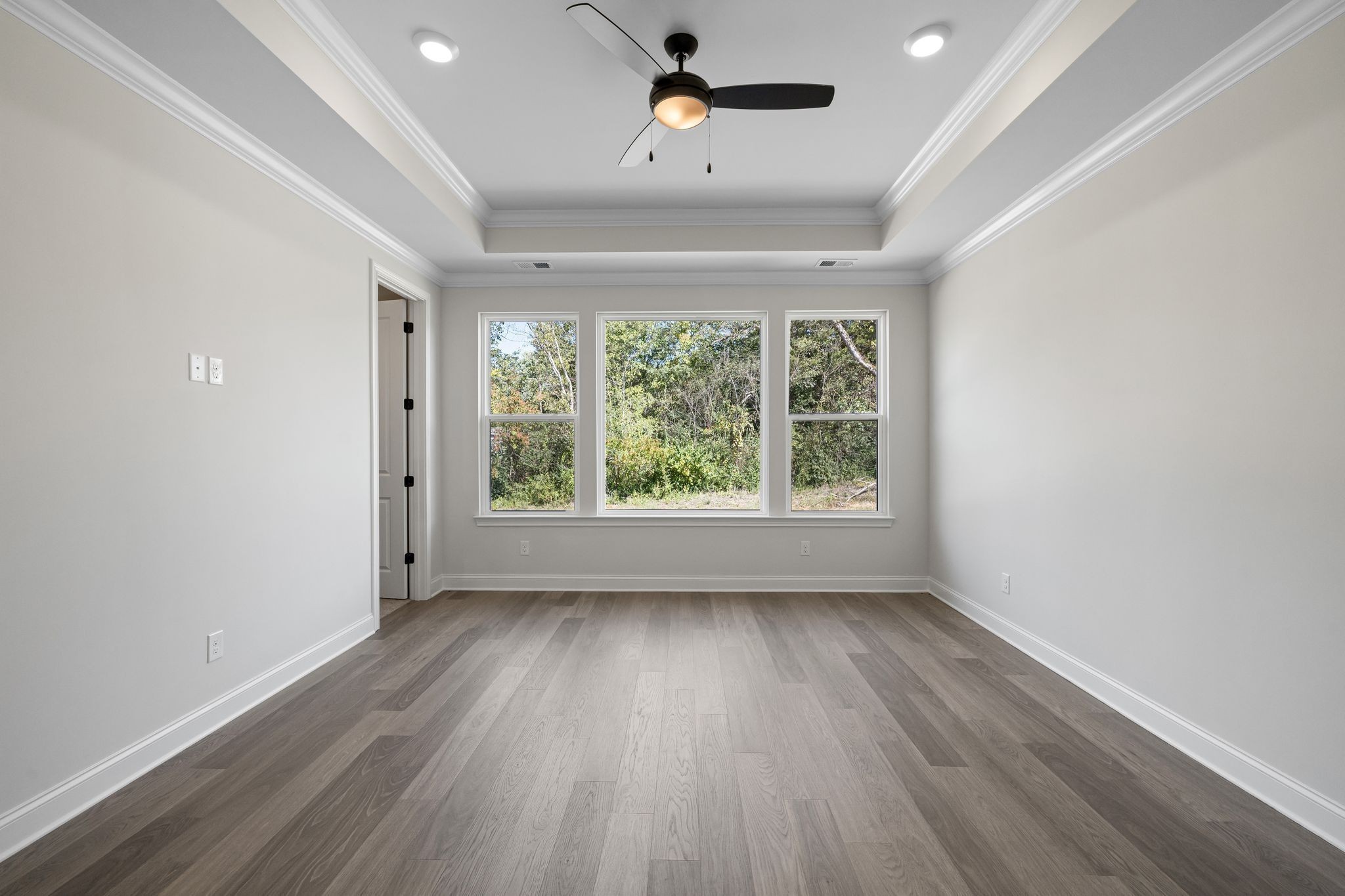 7318 Winners Road Murfreesboro, TN 37129 - Photo 23 of 44 wooden floor in an empty room with a window