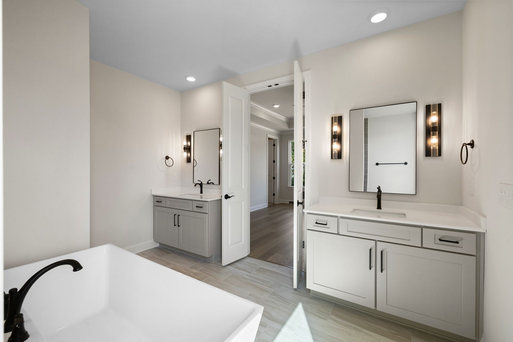 7318 Winners Road Murfreesboro, TN 37129 - Photo 26 of 44 a spacious bathroom with a granite countertop sink mirror and bathtub