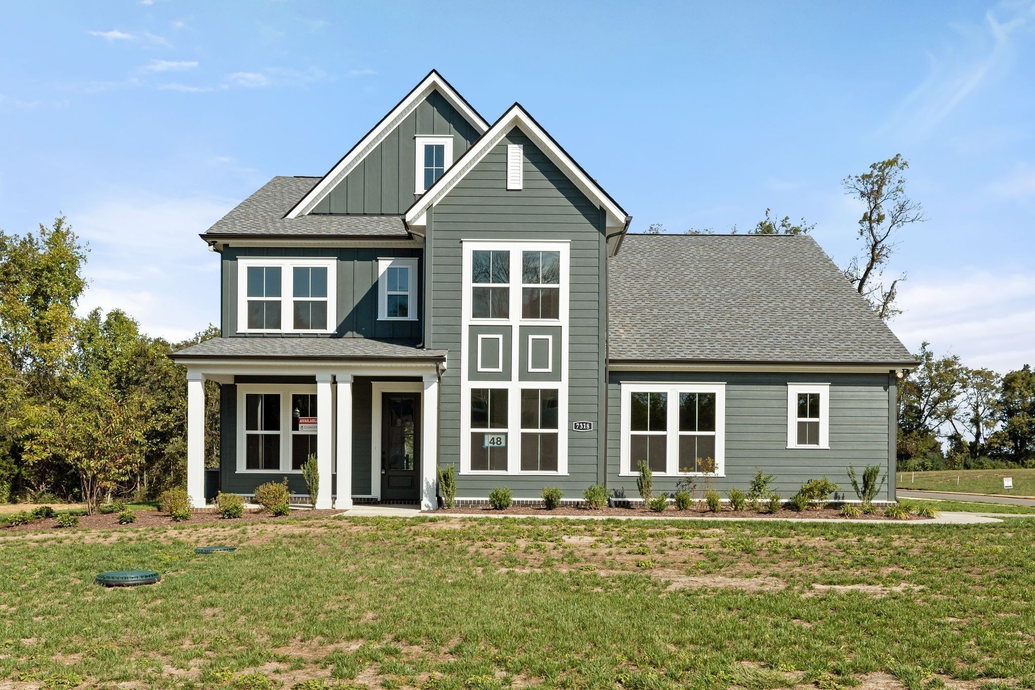 7318 Winners Road Murfreesboro, TN 37129 - Photo 3 of 44 front view of a house with a yard