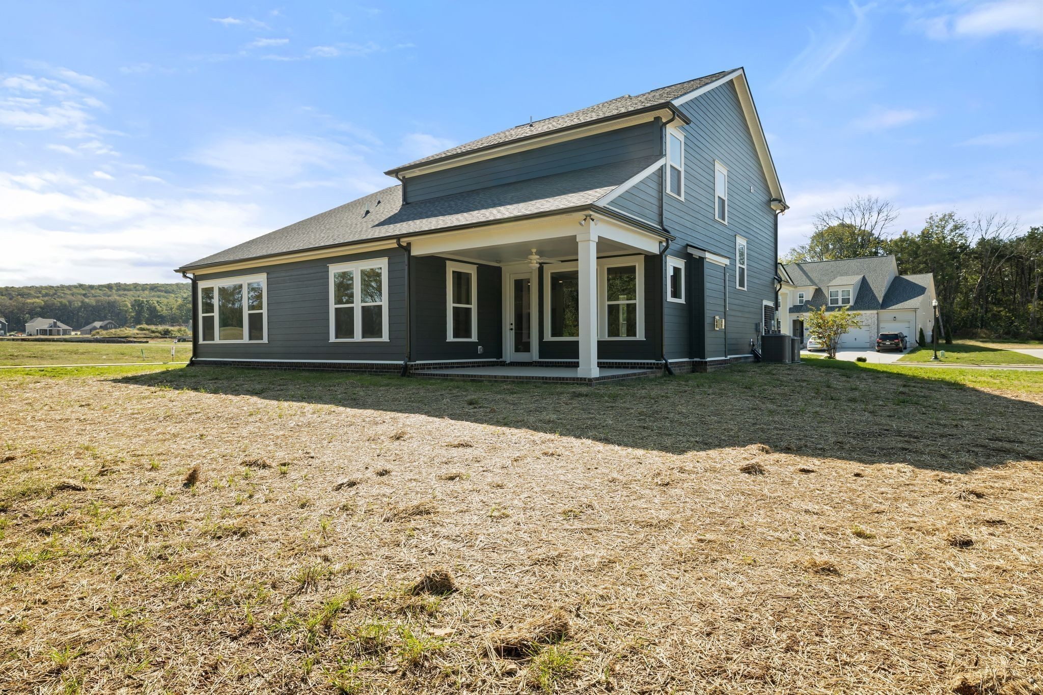 7318 Winners Road Murfreesboro, TN 37129 - Photo 43 of 44 a view of a house with a yard and sitting area