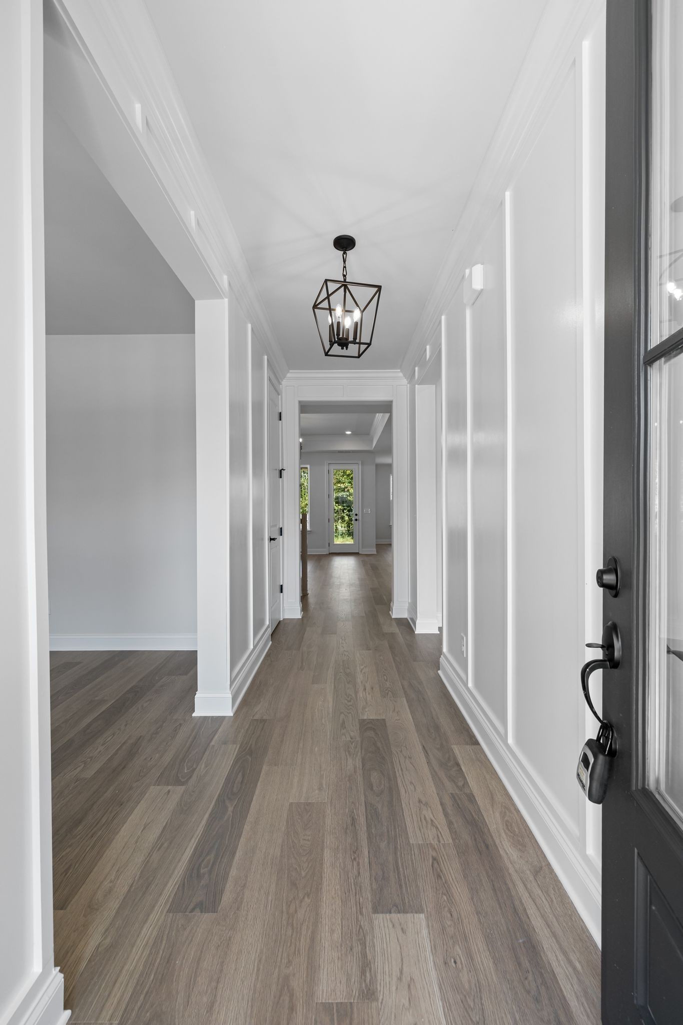 7318 Winners Road Murfreesboro, TN 37129 - Photo 7 of 44 wooden floor in an empty room with a window
