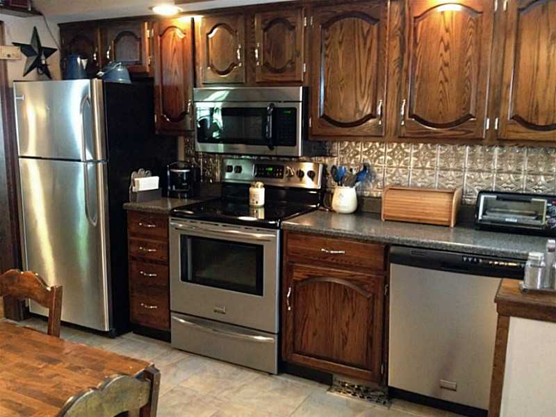 874 Elm Street Woonsocket, RI 02895 - Photo 3 of 24 Kitchen. Updated kitchen with stainless steel appliances!