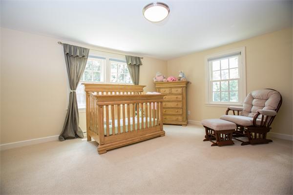 4 Squirrel Hill Road Wayland, MA 01778 - Photo 15 of 23 a bedroom with furniture and a window