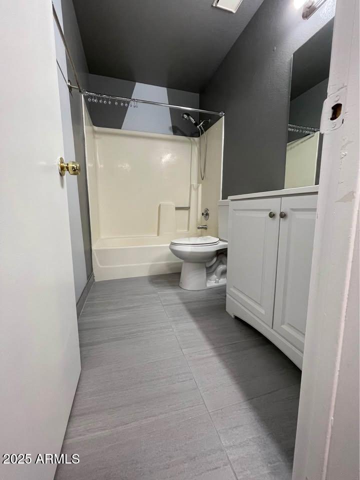 1455 North Alma School Road, Unit 11 Mesa, AZ 85201 - Photo 17 of 22 a view of bathroom with a toilet and a bathtub