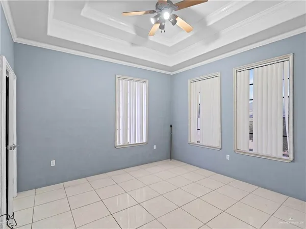 a view of an empty room and window