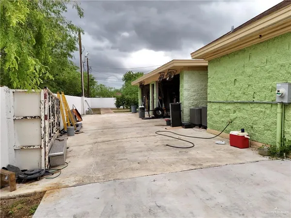 a aerial view of a house with a yard