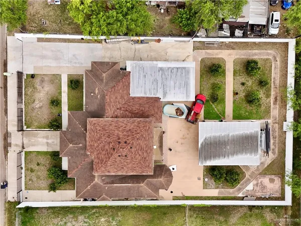 a front view of a house with a garden and porch