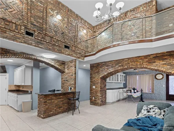 a outdoor living space with patio furniture and a fireplace