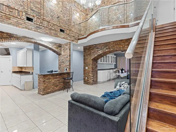 a bathroom with a shower and a sink