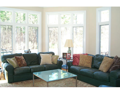 215 Monument Farm Road Concord, MA 01742 - Photo 7 of 8 a living room with furniture and a large window
