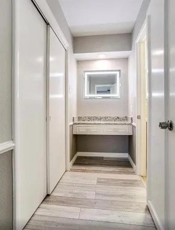 a view of an empty room and fire place