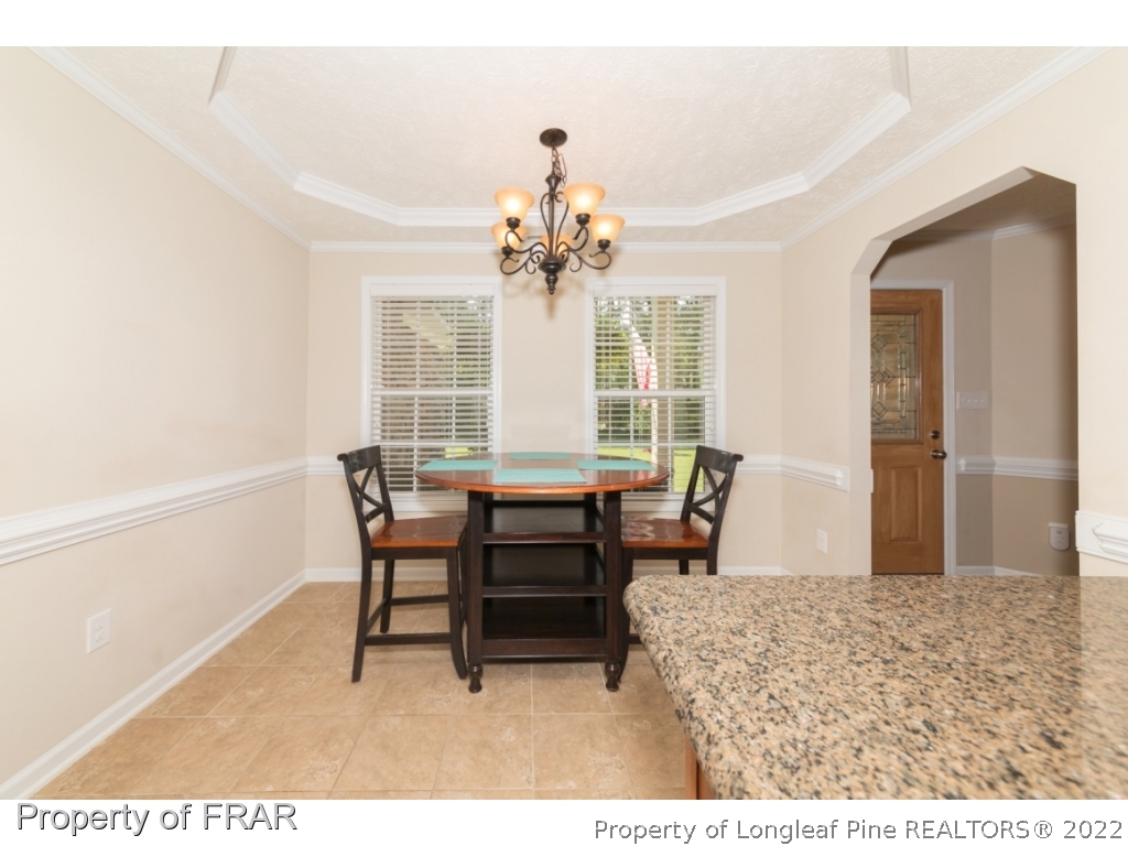 2854 Wade-Stedman Road Stedman, NC 28391 - Photo 13 of 35 a dining room with furniture and window