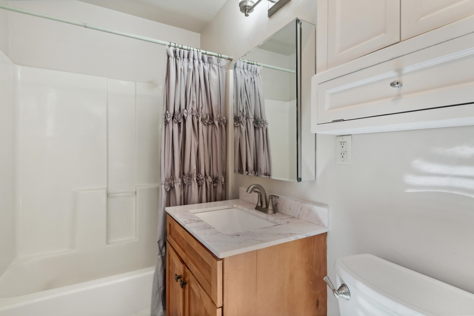 10383 Sugar Pine Road Truckee, CA 96161 - Photo 20 of 21 a bathroom with a sink and a mirror