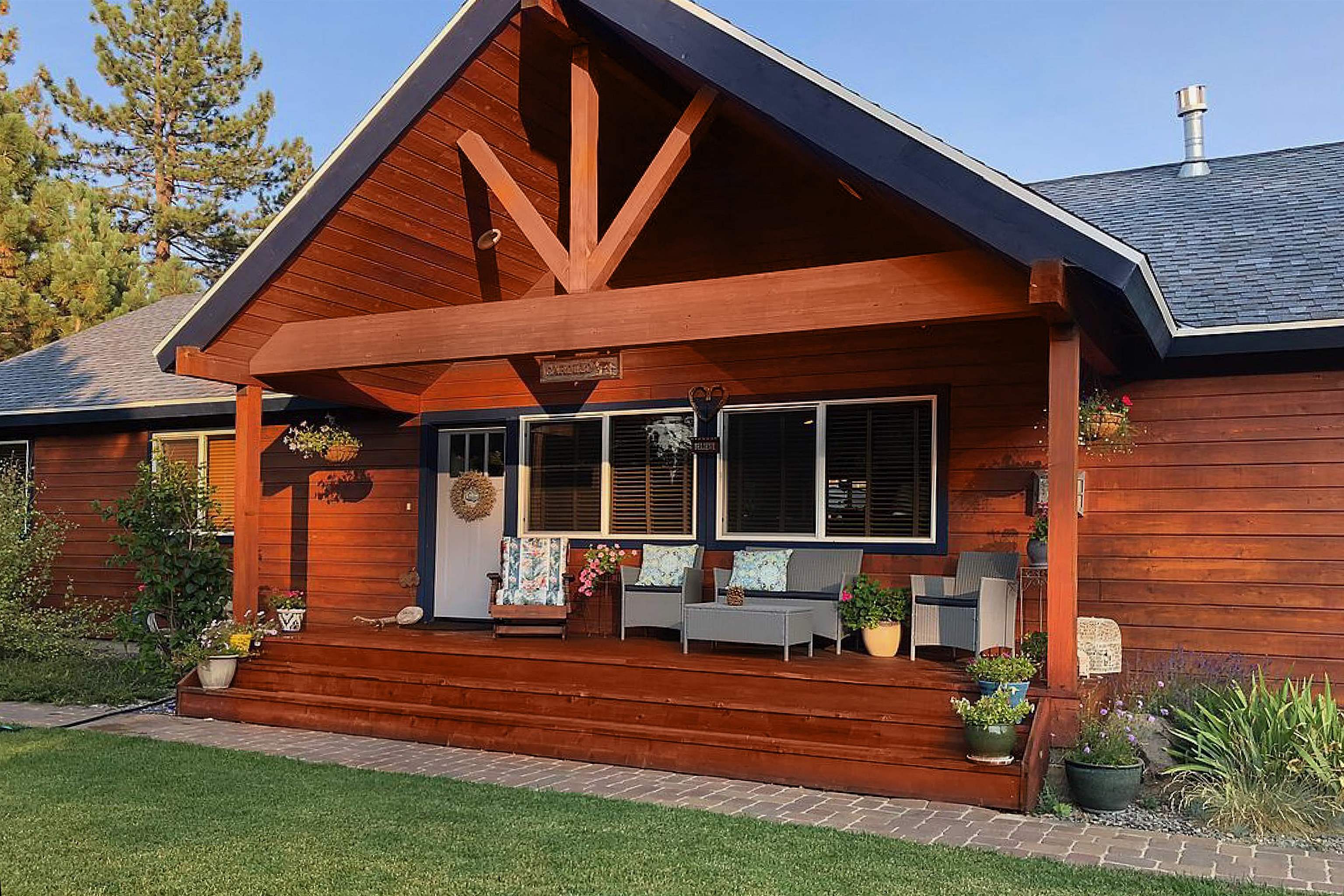 10383 Sugar Pine Road Truckee, CA 96161 - Photo 4 of 21 a front view of a house with a yard