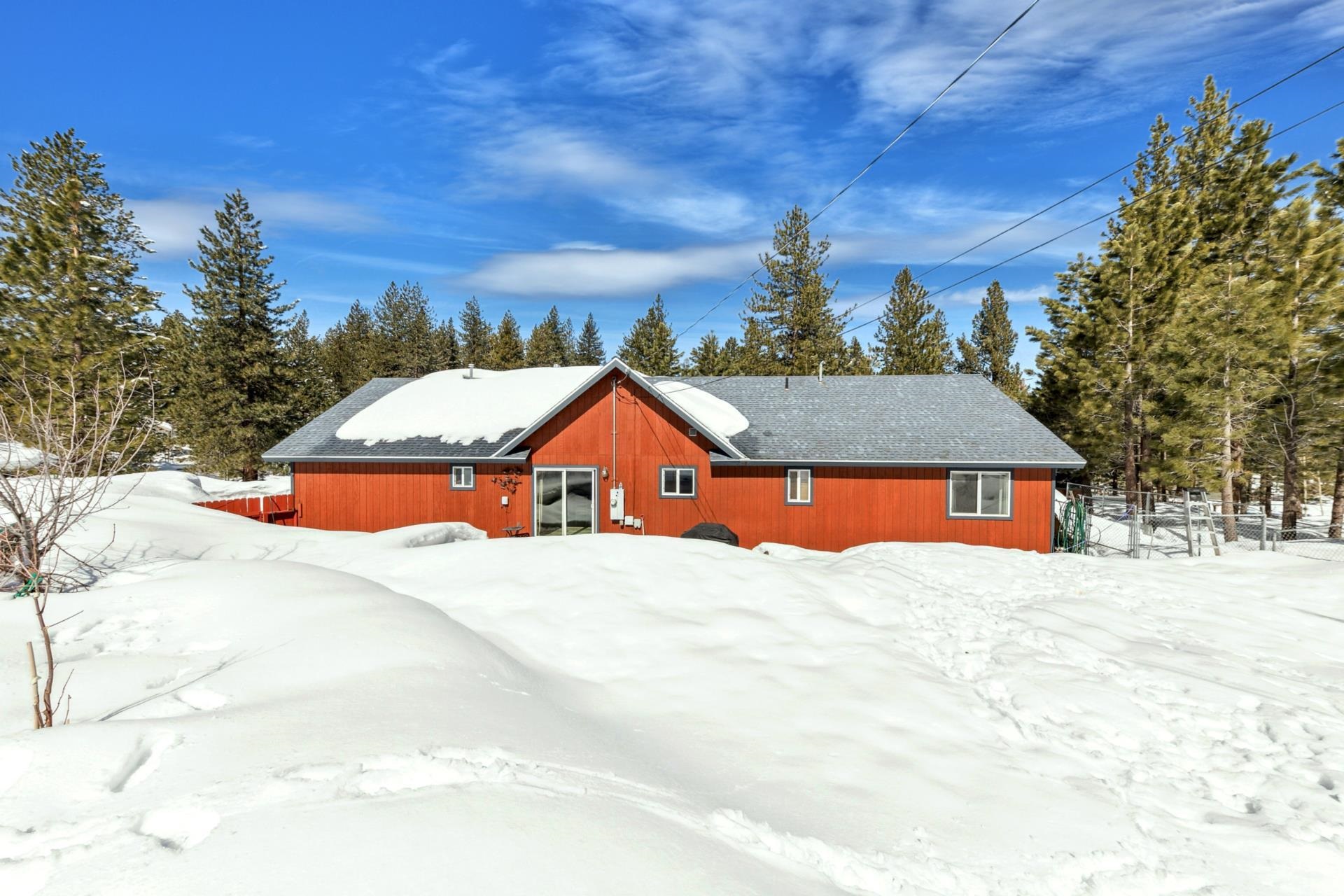 10383 Sugar Pine Road Truckee, CA 96161 - Photo 8 of 21 a view of a house with a yard